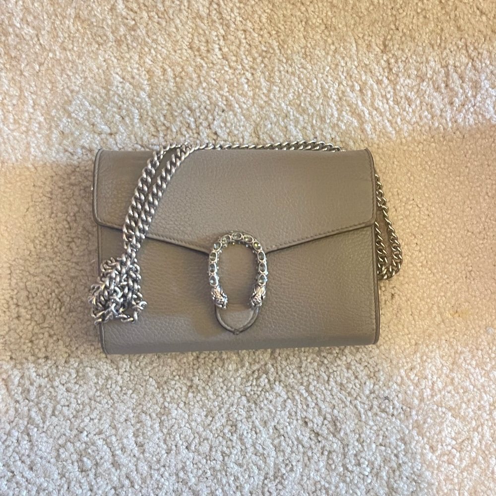 Gray Gucci crossbody bag